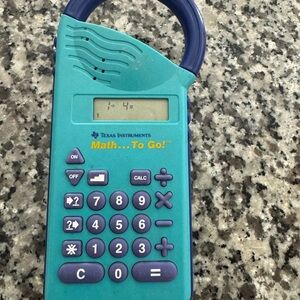 Texas Instruments math to go Teal Handheld Calculator with Purple Buttons